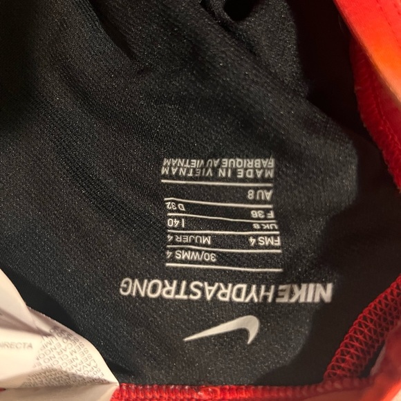 Red, white, orange, and black Nike swim suit - Picture 2 of 3